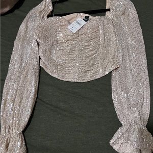 Sequin cropped long sleeve top